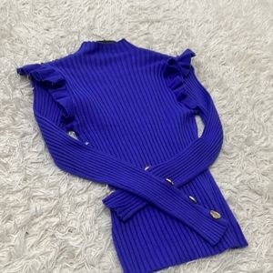 Gorgeous, Deep Purple Knit top with gold embellished buttons.